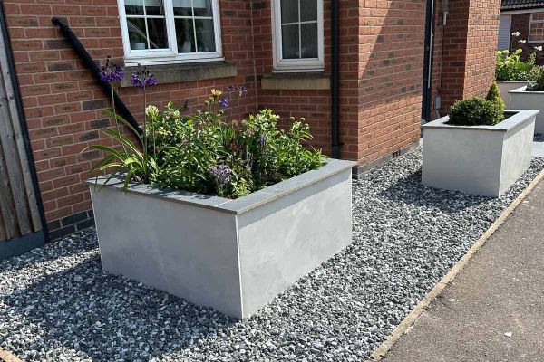 Single panel of Valencia White compact DesignClad exterior wall cladding, showing shape and colour. Free UK delivery available. ***