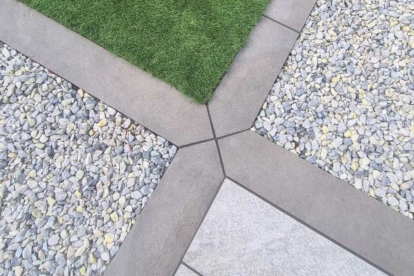 Close-up view of Steel Grey Porcelain Planks, highlighting the modern and sophisticated appearance of this outdoor flooring option.***