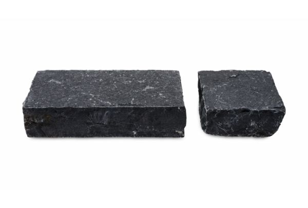 2 Midnight Black limestone setts against white background, one measuring 200x100mm and the other 100x100mm, showing hand-cut edges.***

