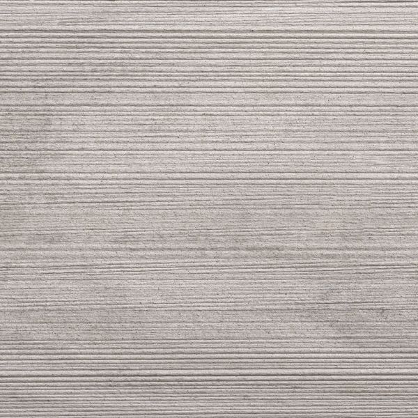 Close-up of square of Polar DesignBoard composite decking plank, showing tones and lined texture. Free UK delivery available. ***
