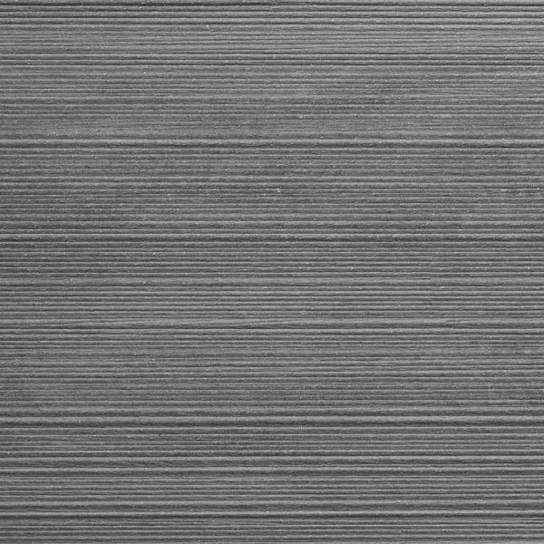 Close-up of square of Traditional DesignBoard composite decking plank, showing tones and lined texture. Free UK delivery available. ***